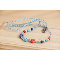 Colgante piedra azul con flor Mod1312