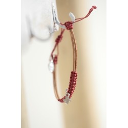 Pul. Cuero y macrame simbolo 1515