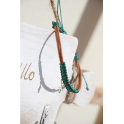 Pul. Cuero y macrame simbolo 1516